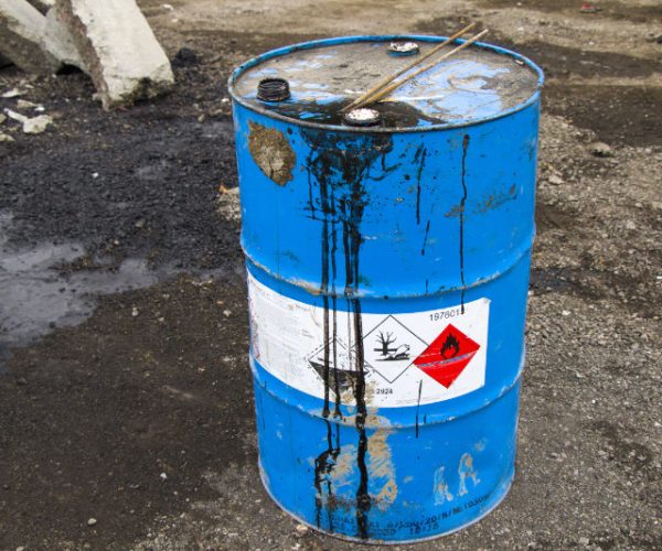 Tbilisi, Georgia - December 01, 2020: Danger liquid material bottle with sings and text.